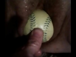 Shoving baseball in hairy Korean vagina